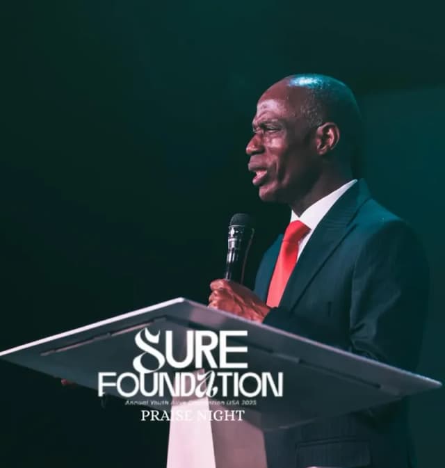 Pastor at podium during AYAC USA Sure Foundation