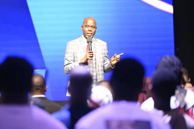 Senior pastor on stage at YAF Canada